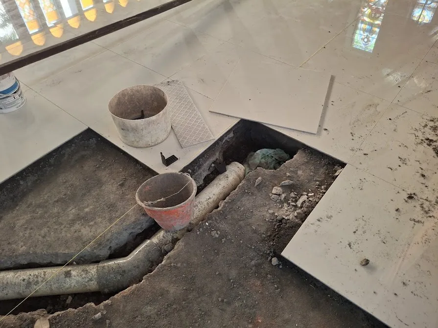 Conduit routes prepared in the floor while renovation work was still under way.